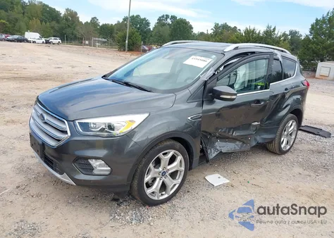 2019 Ford Escape Titanium z USA, uszkodzony, nr VIN 1FMCU0J99KUC17133